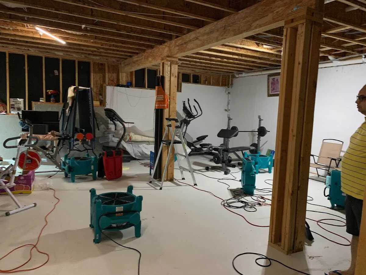 Basement drying equipment setup for Contents Cleaning & Restoration in Swanzey