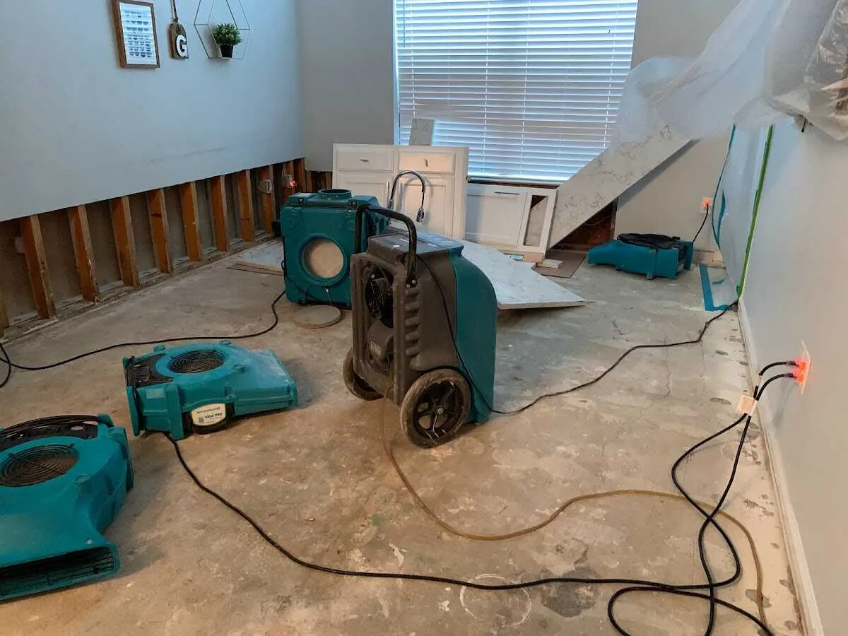 Dehumidifier in flood-cut room for Water Damage Restoration in Swanzey